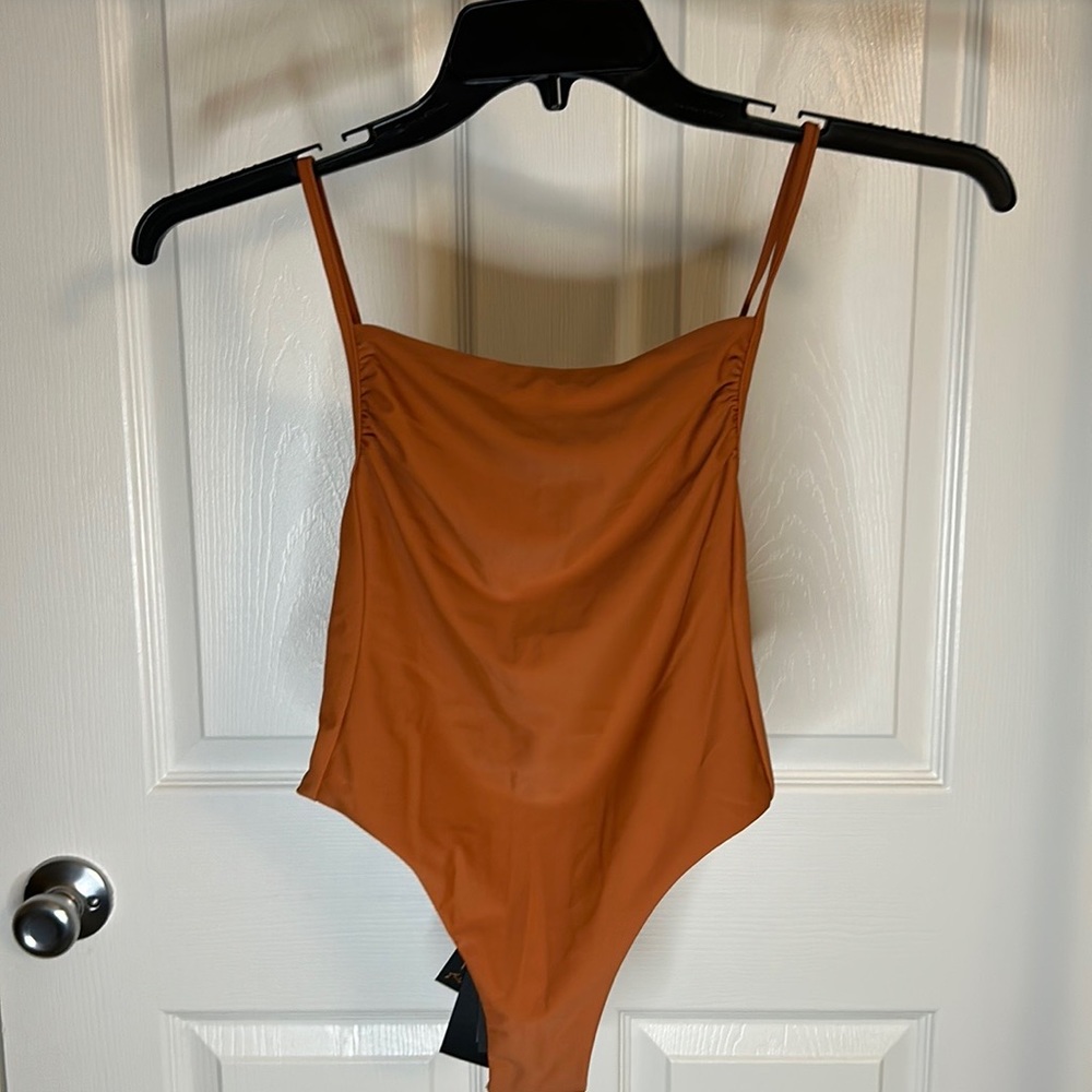 Extra small rust colored Ourkind bikini cut strappy one piece swimsuit
